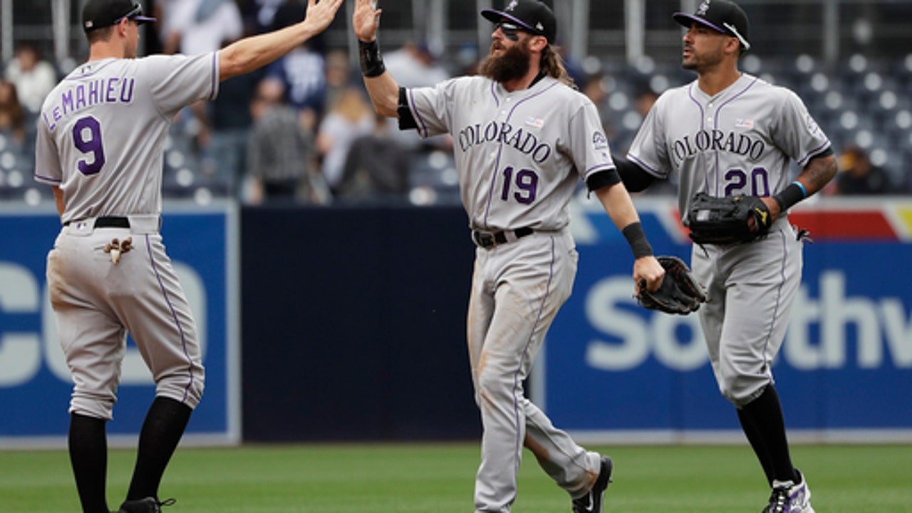 Complete with bushy beard and mullet, Blackmon leads Rockies